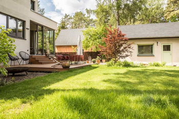 A modern terrace overlooking the garden